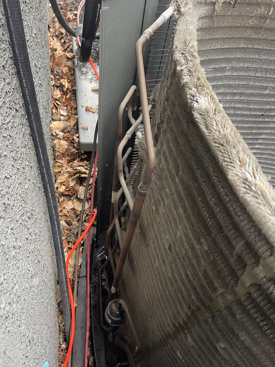 Air Conditioner - outside condenser unit - Hansen Plumbing