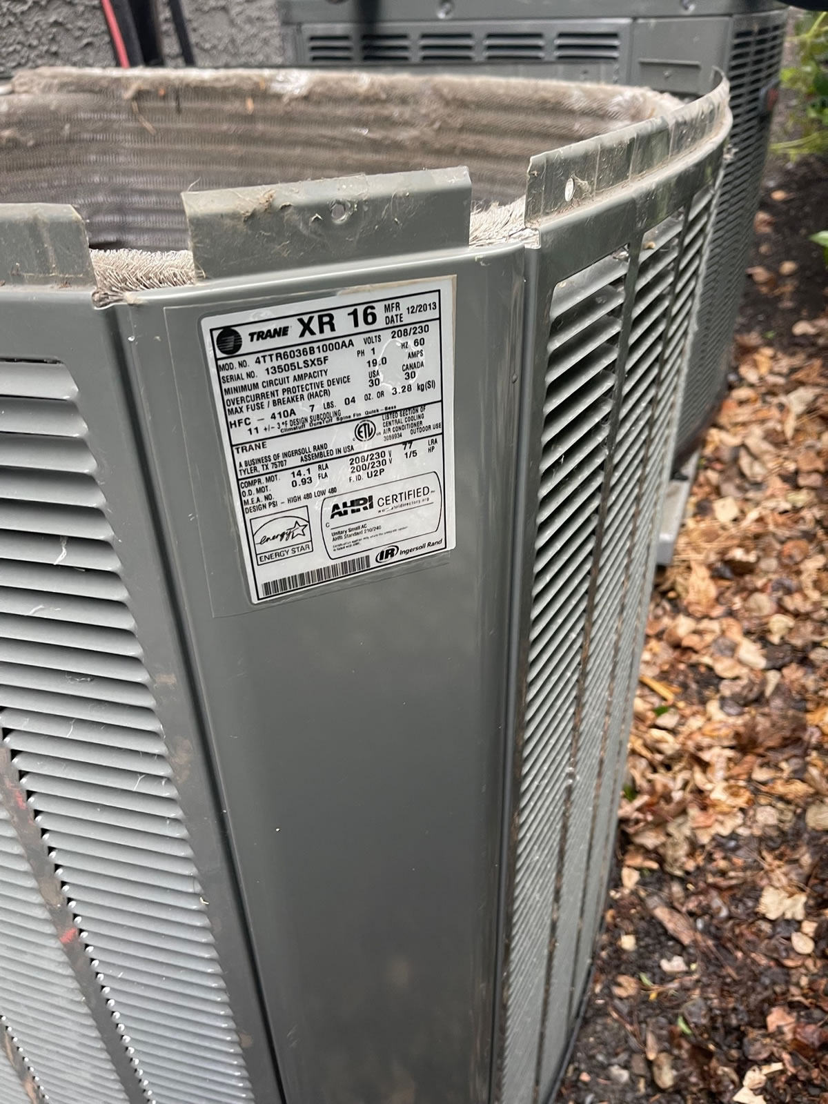 Air Conditioner - outside condenser unit - Hansen Plumbing